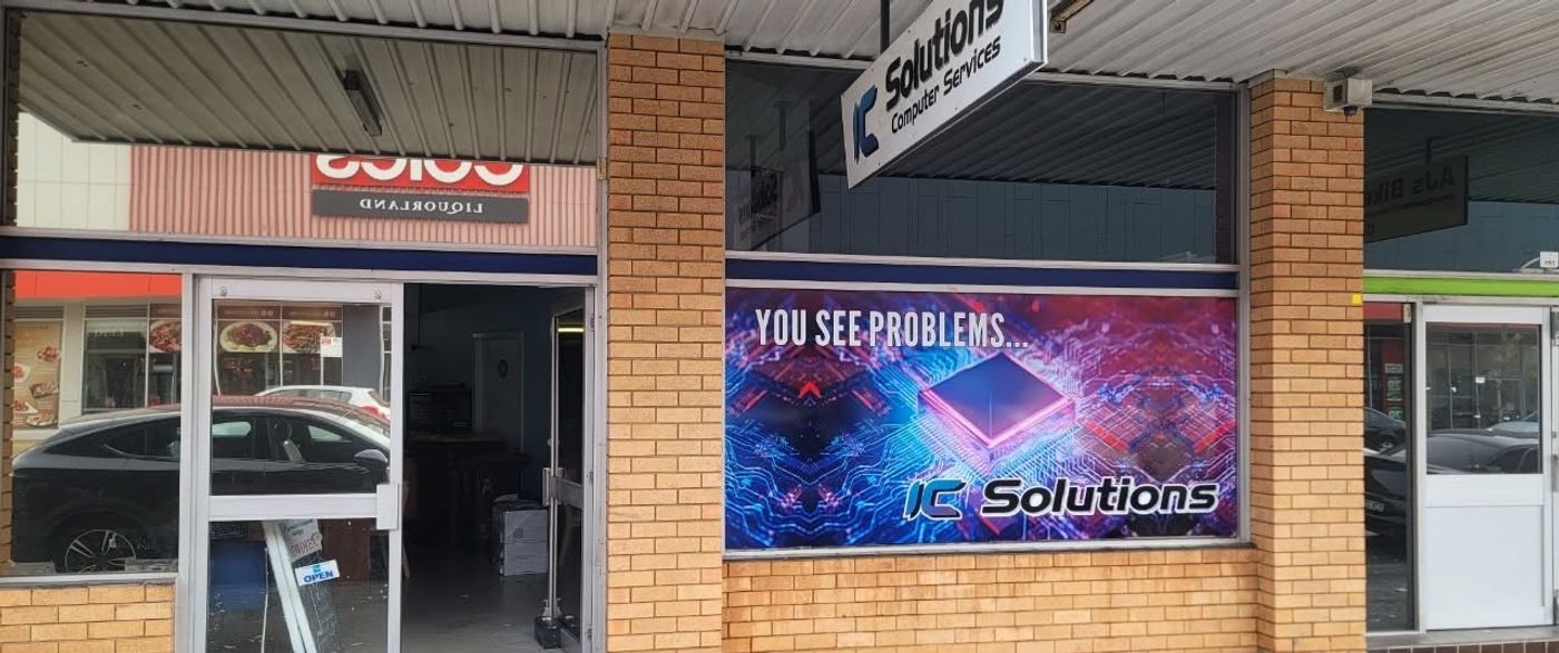 The IC-Solutions shopfront at 150 Maitland Road, Mayfield, with the You See Problems window display